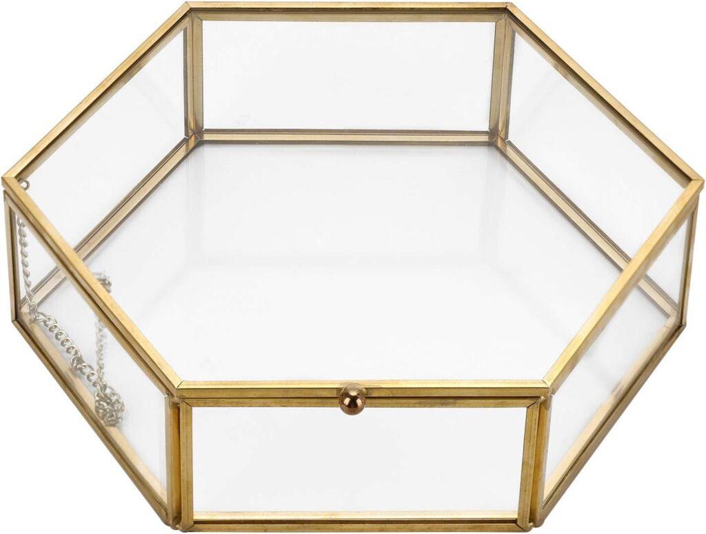 Style a shelf with a gold edged geometric trinket box.